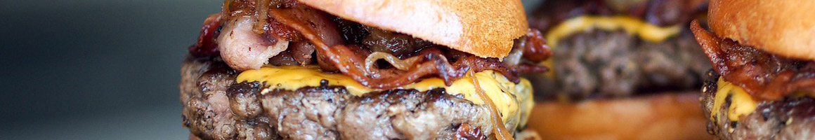 Eating American (Traditional) Burger at Sammy's Craft Burgers & Beers restaurant in Cincinnati, OH.